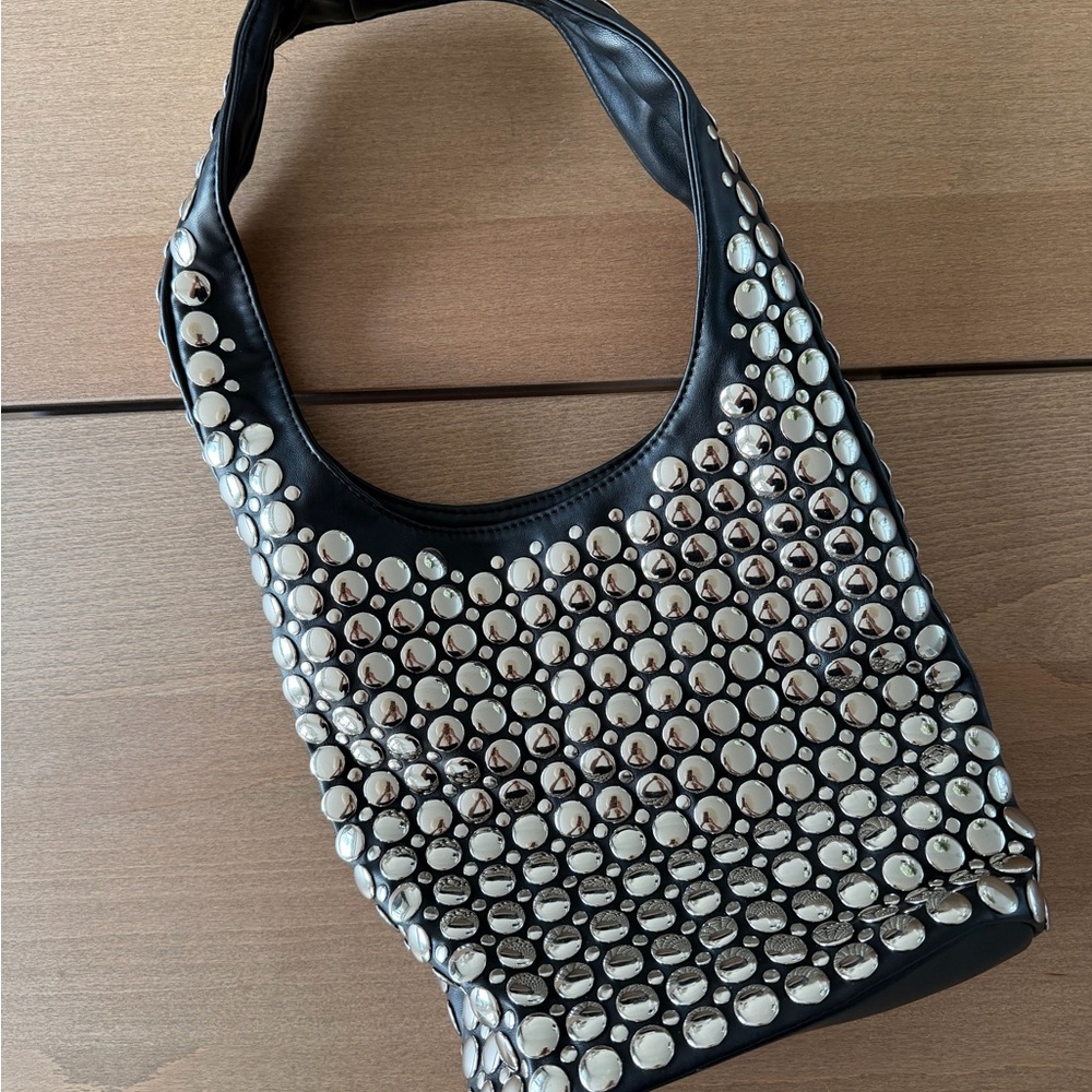 Khaite Style Black Studded Bucket Bag with Silver Accents
